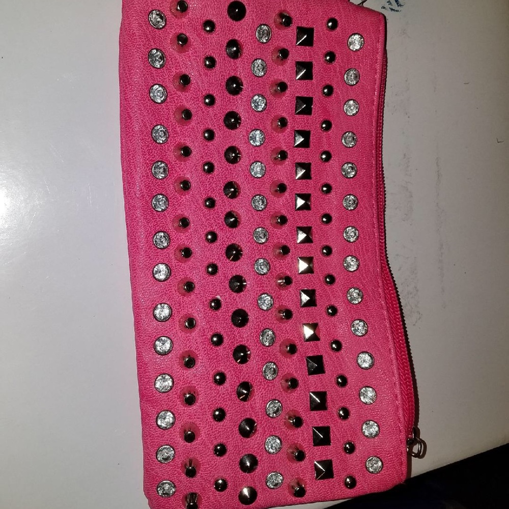 Fuchsia colored cosmetic bag